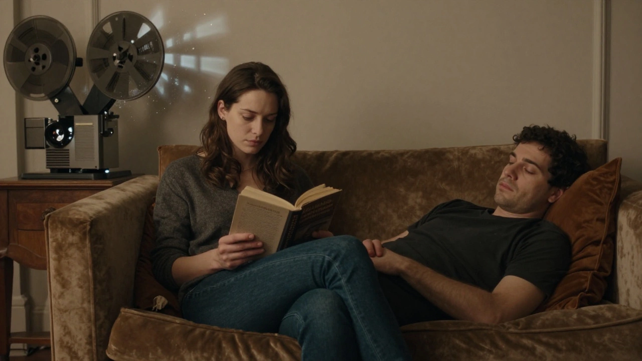 A quiet moment of connection on a velvet couch, reading together under soft film projector light in a Paris apartment.