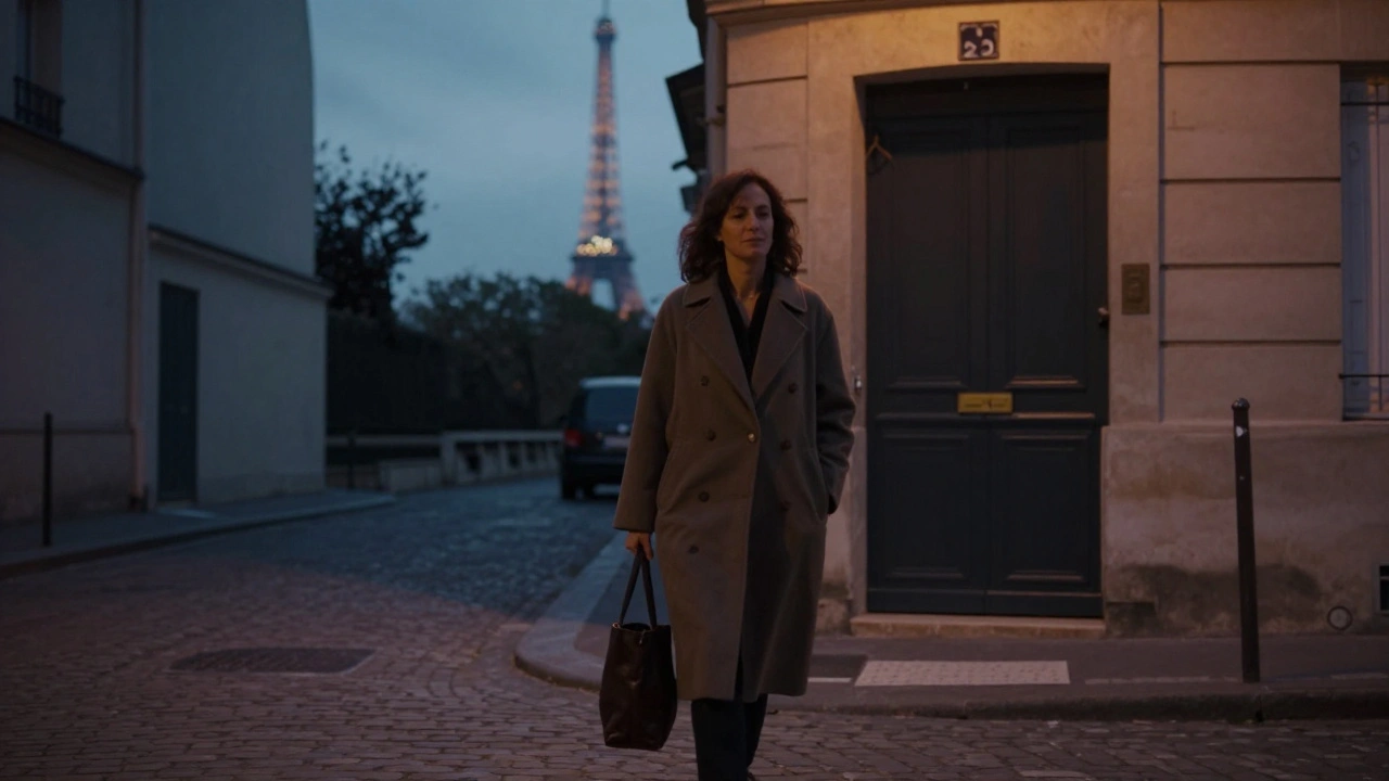A woman walks peacefully down a Parisian street at dusk, hinting at a private massage experience nearby.