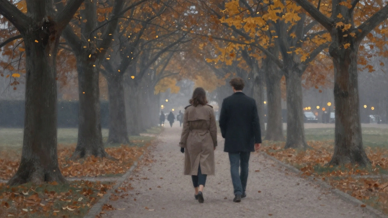 Couple walking through the Bois de Boulogne at dusk, autumn leaves falling gently around them.