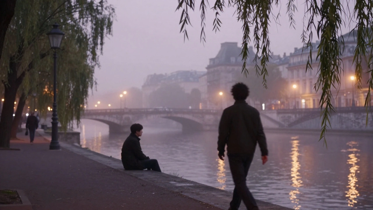 Silhouetted strangers walking side by side along Canal Saint-Martin at midnight.