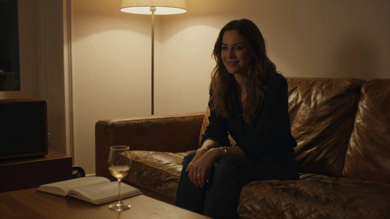 A quiet, intimate moment in a softly lit Paris apartment with an open book and wine glass.